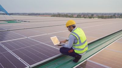 Solar panels in a sunny field